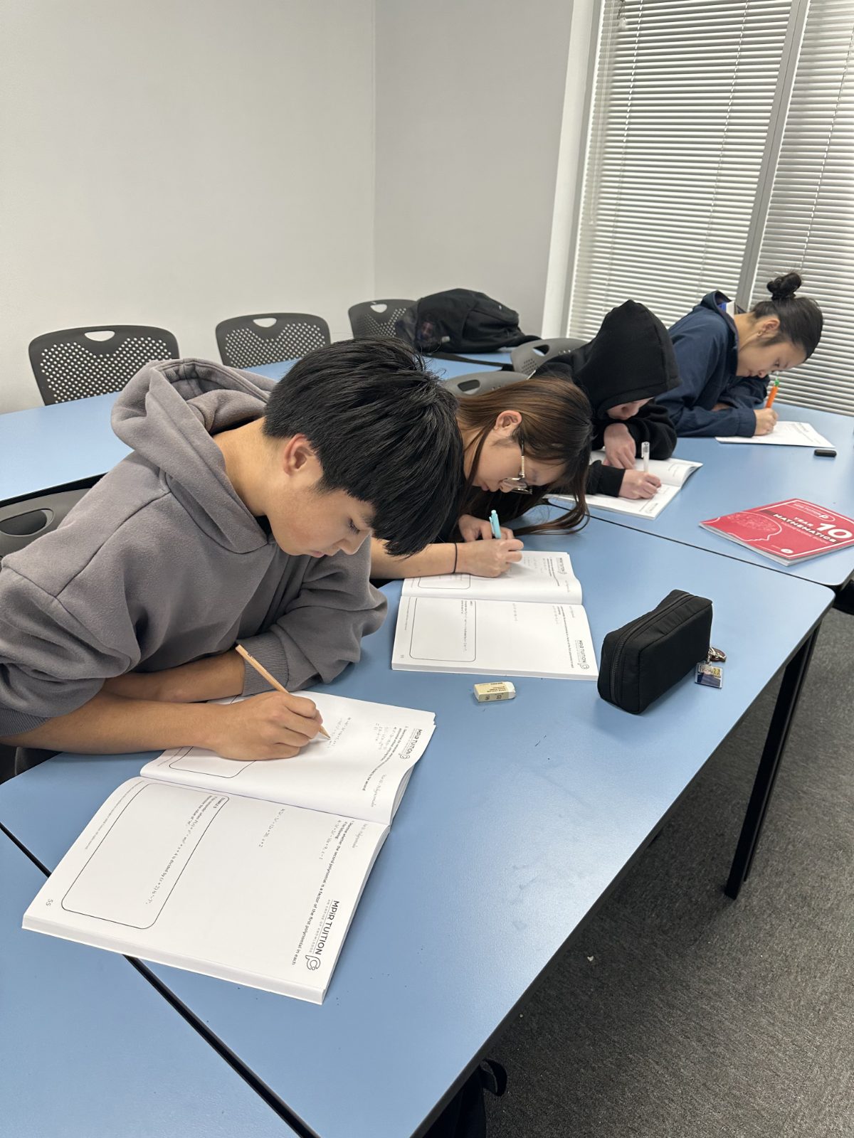 Senior Signal Education students working through harder, exam-style problems